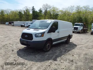 2016 Ford Transit Cargo with VIN 1FTYE1YM0GKB19151, listed as a IAAI auction lot 42029234 with 240,441 mi miles and . Bid and sale history available at DreamBid. Image 17.