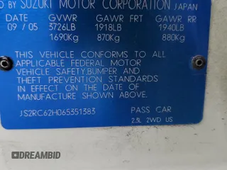 2006 Suzuki Aerio Premium z VIN JS2RC62H065351383, wystawiony jako Copart lot #82933084 z przebiegiem 80 771 mil mil oraz Tytuł czysty. Historia ofert i sprzedaży dostępna na DreamBid. Obrazek 12.