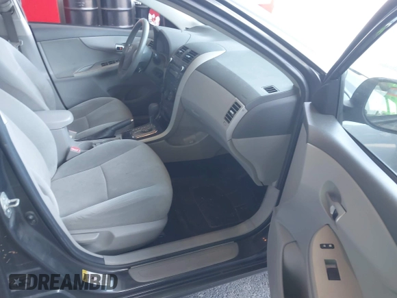 2010 Toyota Corolla with VIN 2T1BU4EE2AC223494, listed as a IAAI auction lot 40296069 with 141,817 mi miles. Bid and sale history available at carsss.com. Image 5.