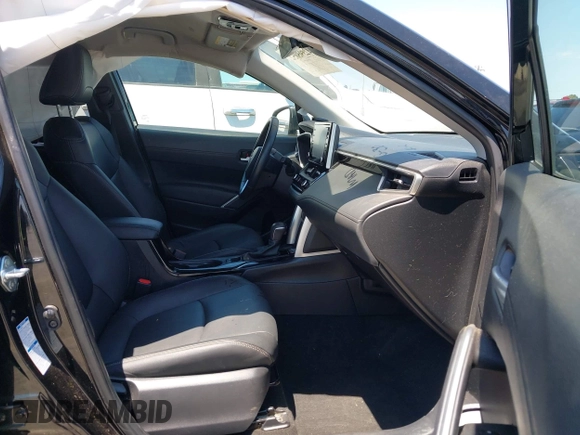 2022 Toyota Corolla Cross XLE with VIN 7MUEAABG3NV042742, listed as a IAAI auction lot 42595052 with 54,299 mi miles and . Bid and sale history available at DreamBid. Image 5.