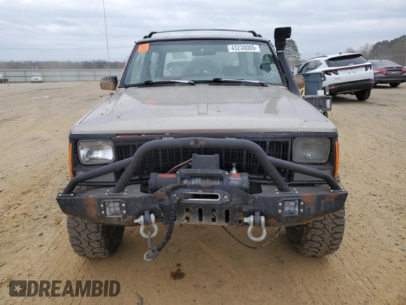 1993 Jeep Cherokee Sport with VIN 1J4FJ67S6PL580133, listed as a Copart auction lot 43230005 with 122,173 mi miles and Salvage Title. Bid and sale history available at carsss.com. Image 5.