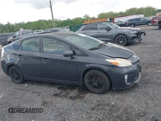 2013 Toyota Prius One with VIN JTDKN3DU8D1716993, listed as a IAAI auction lot 42202519 with 182,421 mi miles and . Bid and sale history available at DreamBid. Image 13.