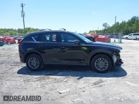 2018 Mazda CX-5 Sport with VIN JM3KFBBM4J0417018, listed as a IAAI auction lot 41984290 with 104,113 mi miles. Bid and sale history available at carsss.com. Image 14.