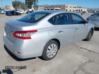 2015 Nissan Sentra S with VIN 3N1AB7AP2FY250683, listed as a IAAI auction lot 41879058 with 106,231 mi miles. Bid and sale history available at carsss.com. Image 4.
