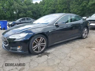 2013 Tesla Model S с VIN 5YJSA1CN8DFP06126, выставлен на аукционе Copart как лот 63098515 с пробегом 47 215 миль миль и Списание • Salvage title. История ставок и продаж доступна на DreamBid. Изображение 1.