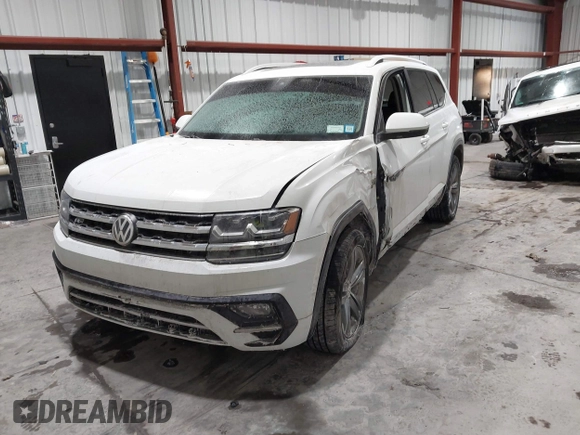 2019 Volkswagen Atlas SE z VIN 1V2XR2CA0KC595596, wystawiony jako IAAI lot #41410019 z przebiegiem 103 336 mil mil oraz . Historia ofert i sprzedaży dostępna na DreamBid. Obrazek 2.