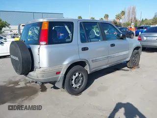 2001 Honda CR-V LX z VIN JHLRD28481S017409, wystawiony jako IAAI lot #41943942 z przebiegiem 134 999 mil mil oraz . Historia ofert i sprzedaży dostępna na DreamBid. Obrazek 4.
