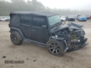 2015 Jeep Wrangler Unlimited Freedom with VIN 1C4BJWDG6FL568583, listed as a Copart auction lot 54266315 with Not provided miles and Salvage title. Bid and sale history available at DreamBid. Image 4.