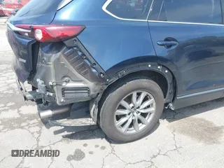 2019 Mazda CX-9 Touring z VIN JM3TCBCY6K0331905, wystawiony jako IAAI lot #42157842 z przebiegiem 84 211 mil mil oraz . Historia ofert i sprzedaży dostępna na DreamBid. Obrazek 19.