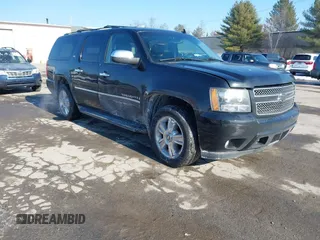 2009 Chevrolet Suburban LTZ with VIN 1GNFK36329R291320, listed as a IAAI auction lot 41393816 with 157,469 mi miles. Bid and sale history available at carsss.com. Image 1.