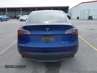 2023 Tesla Model Y Long Range with VIN 7SAYGDEE7PA194998, listed as a IAAI auction lot 41787170 with 16,221 mi miles and . Bid and sale history available at DreamBid. Image 16.