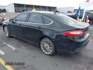2014 Ford Fusion SE with VIN 3FA6P0HD5ER182028, listed as a IAAI auction lot 42108063 with 198,131 mi miles and . Bid and sale history available at DreamBid. Image 3.
