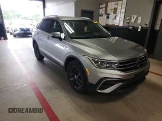 2024 Volkswagen Tiguan SE with VIN 3VV3B7AX5RM084940, listed as a IAAI auction lot 42731231 with 19,747 mi miles and . Bid and sale history available at DreamBid. Image 2.