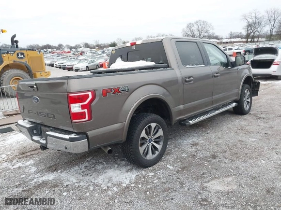 2019 Ford F-150 XL with VIN 1FTEW1E58KKF26818, listed as a IAAI auction lot 41270869 with 112,931 mi miles. Bid and sale history available at carsss.com. Image 4.