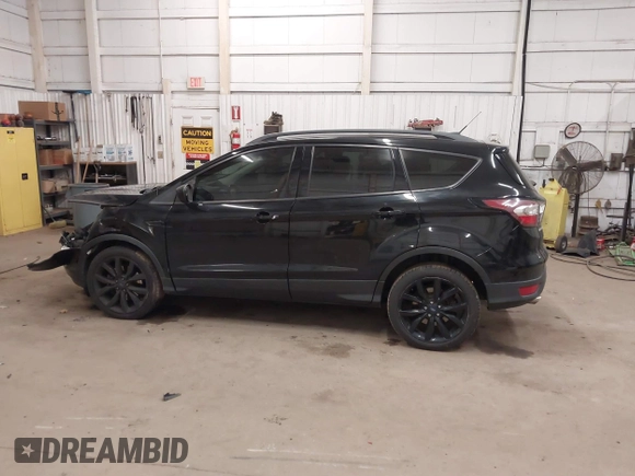 2017 Ford Escape SE with VIN 1FMCU9G98HUE31244, listed as a IAAI auction lot 40985971 with 88,067 mi miles. Bid and sale history available at carsss.com. Image 14.
