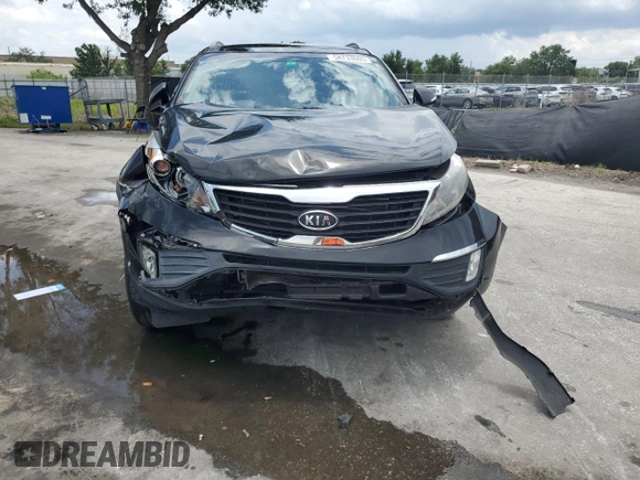 2012 Kia Sportage EX with VIN KNDPC3A21C7303209, listed as a Copart auction lot 58733605 with 189,587 mi miles and Salvage title. Bid and sale history available at DreamBid. Image 5.