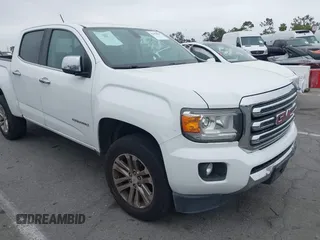2016 GMC Canyon 2WD SLT z VIN 1GTG5DE39G1350662, wystawiony jako IAAI lot #42458869 z przebiegiem 196 408 mil mil oraz . Historia ofert i sprzedaży dostępna na DreamBid. Obrazek 1.