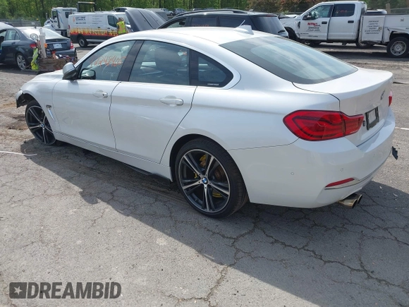 2019 BMW 4 Series 430i xDrive z VIN WBA4J3C55KBL08387, wystawiony jako IAAI lot #42248405 z przebiegiem 115 017 mil mil oraz . Historia ofert i sprzedaży dostępna na DreamBid. Obrazek 3.