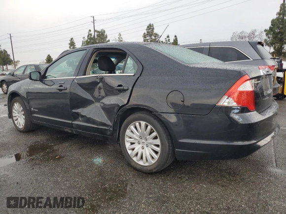 2010 Ford Fusion Hybrid with VIN 3FADP0L31AR228843, listed as a Copart auction lot 59587165 with 308,260 mi miles and Clean title. Bid and sale history available at DreamBid. Image 2.