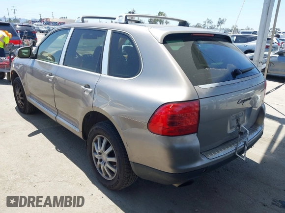 2005 Porsche Cayenne z VIN WP1AA29P55LA24408, wystawiony jako IAAI lot #42398234 z przebiegiem 237 890 mil mil oraz . Historia ofert i sprzedaży dostępna na DreamBid. Obrazek 3.
