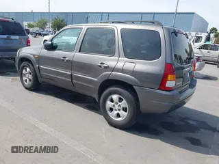 2003 Mazda Tribute LX with VIN 4F2YZ04193KM08890, listed as a IAAI auction lot 42158385 with 282,314 mi miles and . Bid and sale history available at carsss.com. Image 3.