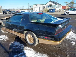 1986 Pontiac Firebird Trans Am with VIN 1G2FW87F6GN210279, listed as a IAAI auction lot 41260317 with 124,290 mi miles. Bid and sale history available at carsss.com. Image 3.