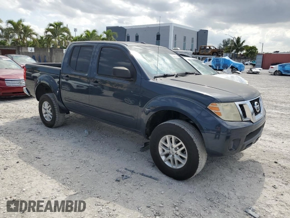 2015 Nissan Frontier SV with VIN 1N6AD0EV7FN739064, listed as a Copart auction lot 52348825 with 137,134 mi miles and Salvage title. Bid and sale history available at DreamBid. Image 4.
