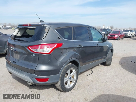 2015 Ford Escape SE with VIN 1FMCU0G76FUC78192, listed as a IAAI auction lot 41828183 with 80,348 mi miles. Bid and sale history available at carsss.com. Image 4.