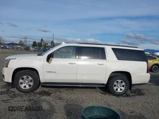 2015 GMC Yukon XL SLT with VIN 1GKS2HKC3FR586338, listed as a IAAI auction lot 41632662 with 149,133 mi miles. Bid and sale history available at carsss.com. Image 14.