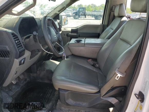 2018 Ford F-150 XL with VIN 1FTMF1CB2JKC31099, listed as a Copart auction lot 52078995 with 219,569 mi miles and Salvage title. Bid and sale history available at DreamBid. Image 7.