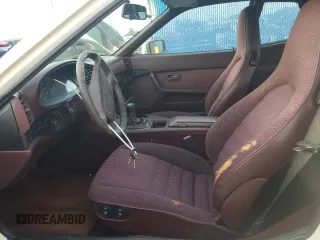1987 Porsche 944 z VIN WP0AB0948HN473051, wystawiony jako Copart lot #73666654 z przebiegiem 82 580 mil mil oraz Szkoda całkowita • Salvage title. Historia ofert i sprzedaży dostępna na DreamBid. Obrazek 7.