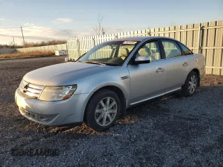 2009 Ford Taurus SEL with VIN 1FAHP24W79G103208, listed as a Copart auction lot 77621914 with 231,659 mi miles and Salvage Title. Bid and sale history available at carsss.com. Image 1.