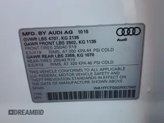 2016 Audi Q3 Prestige with VIN WA1FFCFS0GR007940, listed as a Copart auction lot 57384685 with 61,336 mi miles and Salvage title. Bid and sale history available at DreamBid. Image 13.