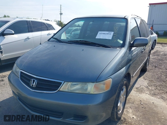 2001 Honda Odyssey EX z VIN 2HKRL18601H532141, wystawiony jako IAAI lot #41981052 z przebiegiem 126 931 mil mil oraz . Historia ofert i sprzedaży dostępna na DreamBid. Obrazek 12.