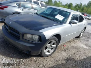 2010 Dodge Charger SXT with VIN 2B3CA3CVXAH246765, listed as a IAAI auction lot 41936893 with 151,865 mi miles. Bid and sale history available at carsss.com. Image 2.