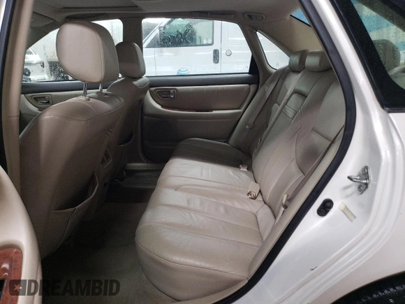 2003 Toyota Avalon XL with VIN 4T1BF28B73U330445, listed as a Copart auction lot 49662095 with 106,597 mi miles and Salvage Title. Bid and sale history available at carsss.com. Image 10.