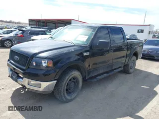 2004 Ford F-150 XLT with VIN 1FTPW14524KC86744, listed as a IAAI auction lot 41811231 with 176,532 mi miles. Bid and sale history available at carsss.com. Image 2.