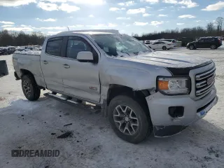 2015 GMC Canyon 4WD SLE with VIN 1GTG6BE37F1187705, listed as a Copart auction lot 87923705 with 111,254 mi miles and Salvage Title. Bid and sale history available at carsss.com. Image 4.