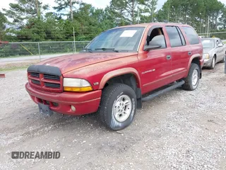 2000 Dodge Durango z VIN 1B4HS28N8YF101866, wystawiony jako IAAI lot #42377212 z przebiegiem 139 541 mil mil oraz . Historia ofert i sprzedaży dostępna na DreamBid. Obrazek 2.