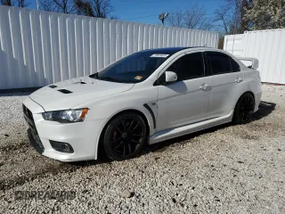 2015 Mitsubishi Lancer Evolution Final Edition z VIN JA32W7FV8FU028275, wystawiony jako Copart lot #77591623 z przebiegiem 44 124 mil mil oraz . Historia ofert i sprzedaży dostępna na DreamBid. Obrazek 1.