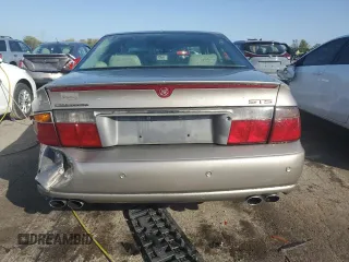 2003 Cadillac Seville Touring STS z VIN 1G6KY54943U118351, wystawiony jako Copart lot #74207414 z przebiegiem 55 204 mil mil oraz Szkoda całkowita • Salvage title. Historia ofert i sprzedaży dostępna na DreamBid. Obrazek 6.