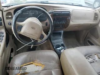2000 Ford Explorer z VIN 1FMDU65P9YUB42443, wystawiony jako Copart lot #70036074 z przebiegiem 175 479 mil mil oraz Szkoda całkowita • Salvage title. Historia ofert i sprzedaży dostępna na DreamBid. Obrazek 8.