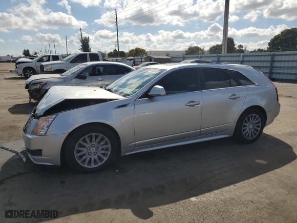 2013 Cadillac CTS Wagon Luxury with VIN 1G6DE8E51D0101658, listed as a Copart auction lot 44443065 with 135,727 mi miles and Salvage Title. Bid and sale history available at carsss.com. Image 1.