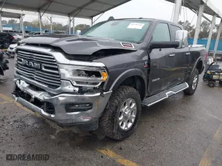 2022 Ram 2500 Laramie with VIN 3C6UR5FL2NG243857, listed as a IAAI auction lot 41736144 with 58,474 mi miles. Bid and sale history available at carsss.com. Image 2.