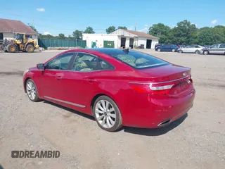 2013 Hyundai Azera z VIN KMHFH4JG7DA222410, wystawiony jako IAAI lot #40175444 z przebiegiem Nie podano mil oraz . Historia ofert i sprzedaży dostępna na DreamBid. Obrazek 3.