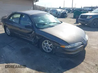 2000 Oldsmobile Intrigue GX z VIN 1G3WH52H0YF280823, wystawiony jako IAAI lot #42199925 z przebiegiem 102 427 mil mil oraz . Historia ofert i sprzedaży dostępna na DreamBid. Obrazek 1.