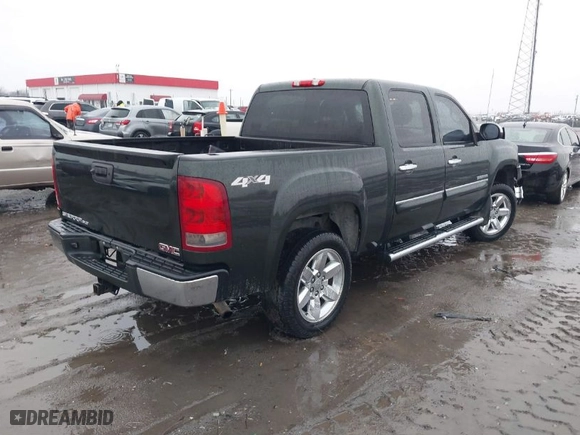 2013 GMC Sierra 1500 SLT with VIN 3GTP2WE70DG205210, listed as a IAAI auction lot 41107618 with 166,354 mi miles. Bid and sale history available at carsss.com. Image 4.