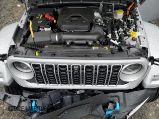 2024 Jeep Wrangler Sahara with VIN 1C4RJXP65RW210689, listed as a Copart auction lot 66482724 with 4,872 mi miles and Salvage Title. Bid and sale history available at DreamBid. Image 12.