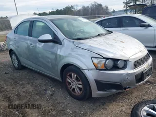 2013 Chevrolet Sonic LT with VIN 1G1JC5SH1D4205197, listed as a IAAI auction lot 41623803 with 153,666 mi miles and . Bid and sale history available at DreamBid. Image 1.