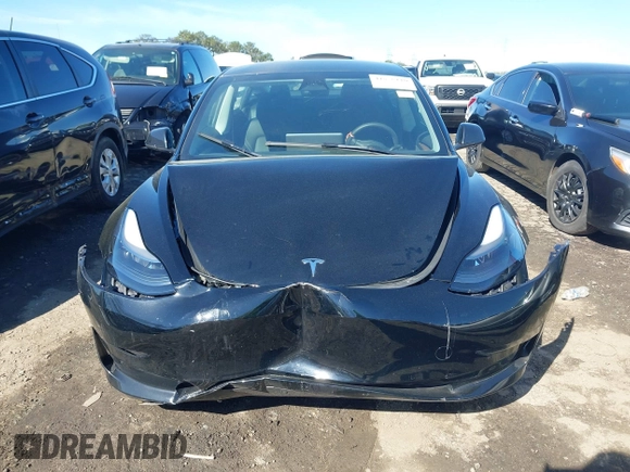 2023 Tesla Model 3 with VIN 5YJ3E1EA2PF482536, listed as a IAAI auction lot 41858110 with 6,298 mi miles. Bid and sale history available at carsss.com. Image 12.